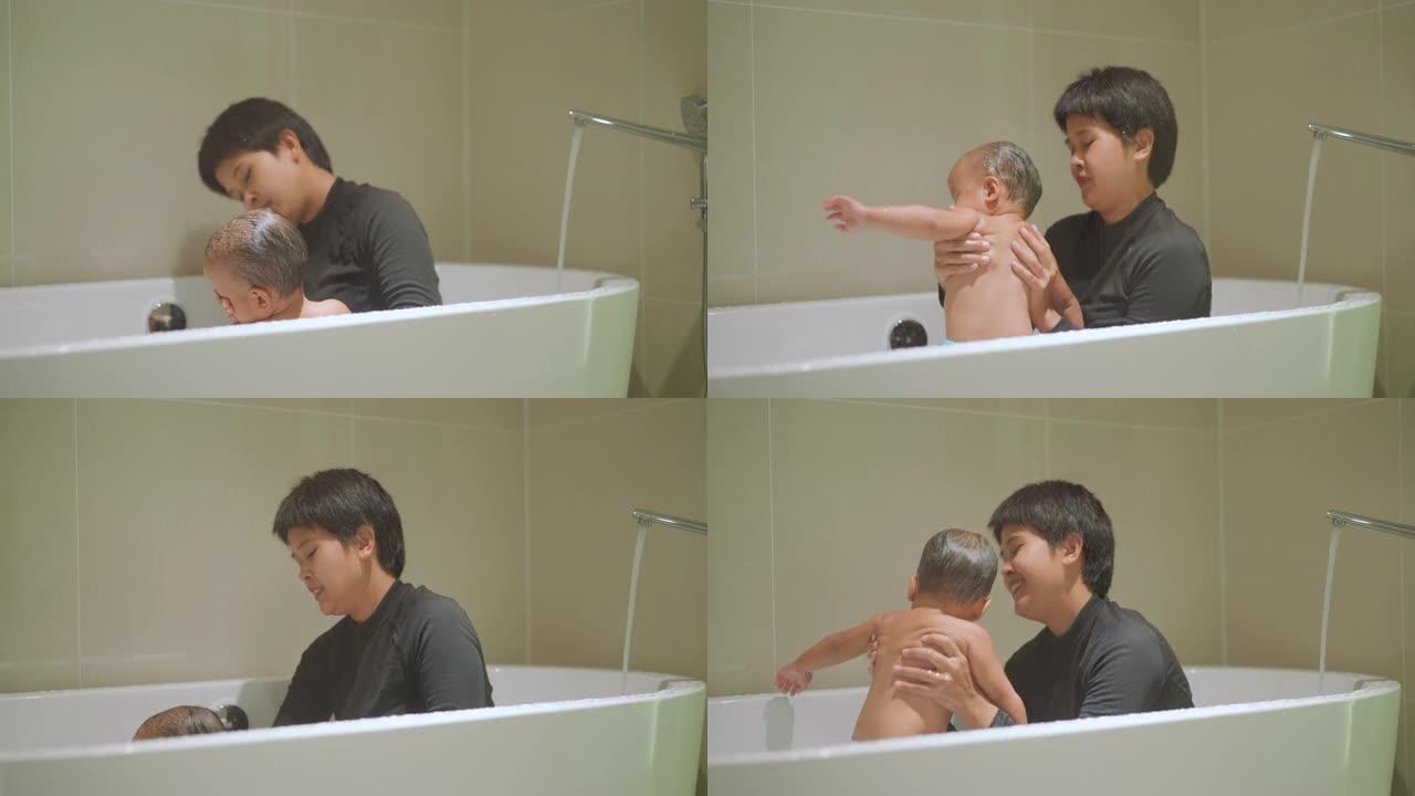 小婴儿在浴缸里和妈妈一起洗澡
