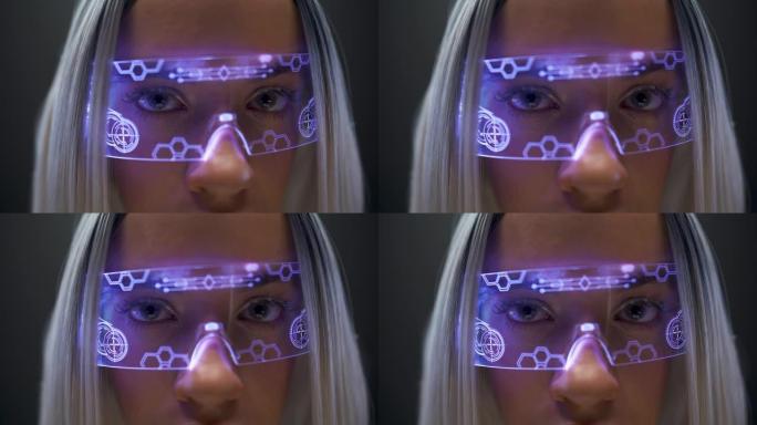 严重的VR眼镜女人脸特写。通过智能护目镜观看女孩的脸