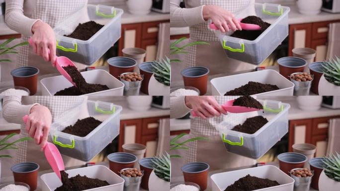 家庭园艺和植物移植-妇女用花园勺倒土箱制备基质