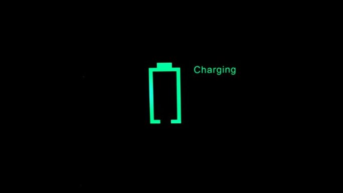 “充电” 发光绿色电池充电指示灯。快速充电技术。