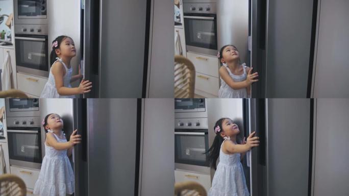 亚裔华裔少女上午开冰箱取回食物