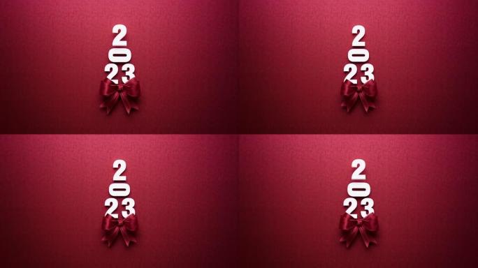 2023和红色领结在红色背景上形成圣诞树4 k分辨率