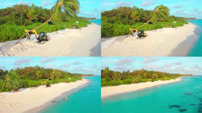 在一个热带岛屿上，黄色拖拉机的鸟瞰图将白色的沙滩上的棕榈树夷为平地。