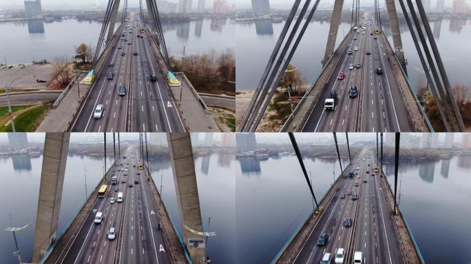 无人机飞过北桥的钢绳墩俯瞰汽车交通
