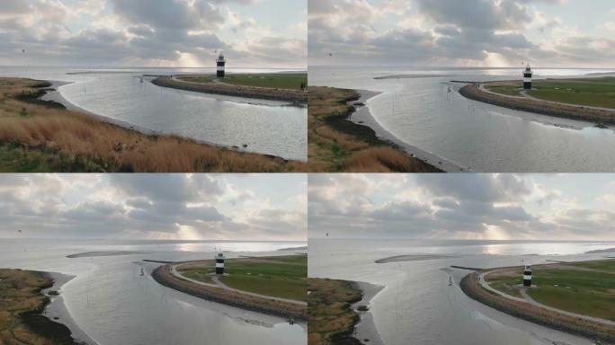 在美丽的德国北部，灯塔在北海附近的空中拍摄。