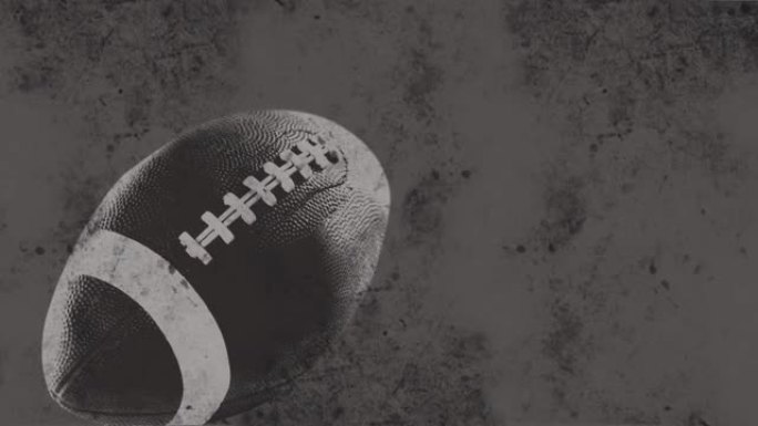 灰色背景上的美式橄榄球球动画