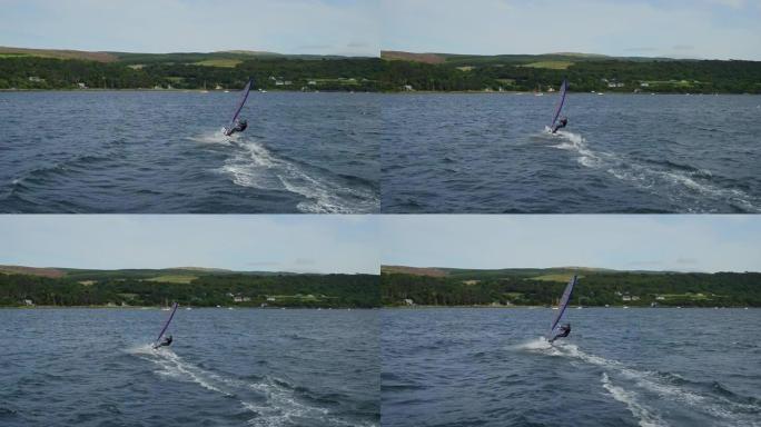 在苏格兰穆尔的声音中拍摄了令人惊叹的快速帆板跟踪镜头