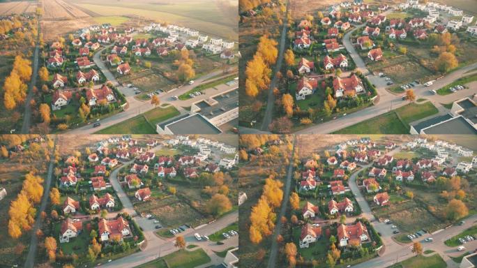春季住宅的鸟瞰图，建立了美国郊区的镜头。房地产，无人机拍摄，日落，阳光，从上面看。