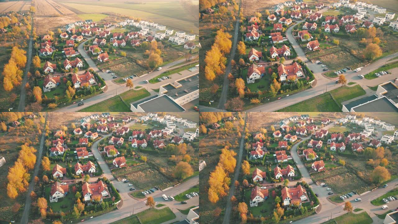 春季住宅的鸟瞰图，建立了美国郊区的镜头。房地产，无人机拍摄，日落，阳光，从上面看。