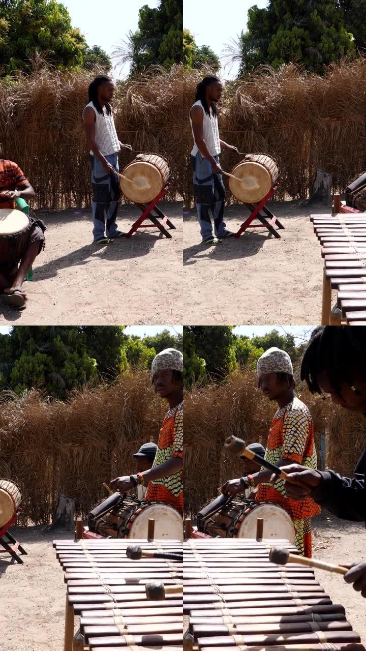 一群黑人一起演奏各种非洲乐器的垂直视频