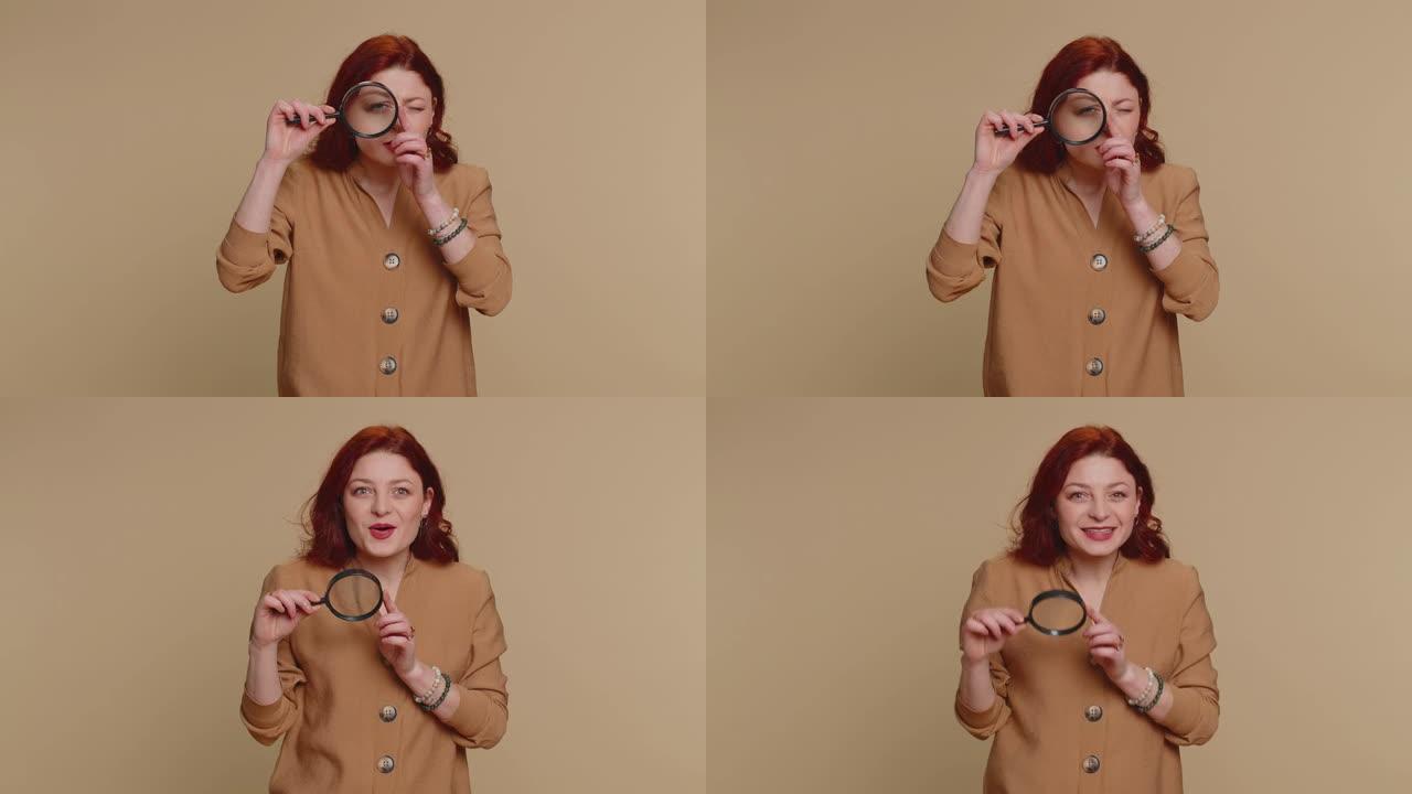 研究人员的女人用放大镜靠近脸部，用大变焦眼睛看着相机