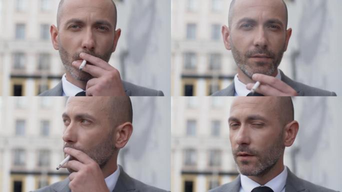 有吸引力的大胡子男人在商业西装吸烟在户外的街道