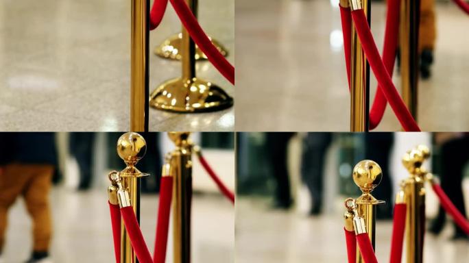 天鹅绒红色豪华绳索在博物馆或vip区音乐会的珍贵展览中关闭