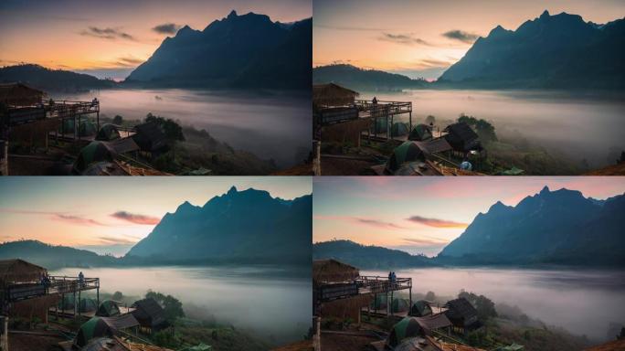 在Doi Luang Chiang Dao山上日出，在传统部落Ban Na老迈村的山谷中有雾