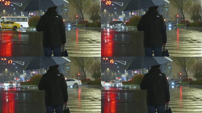 男士雨中等红黄绿灯