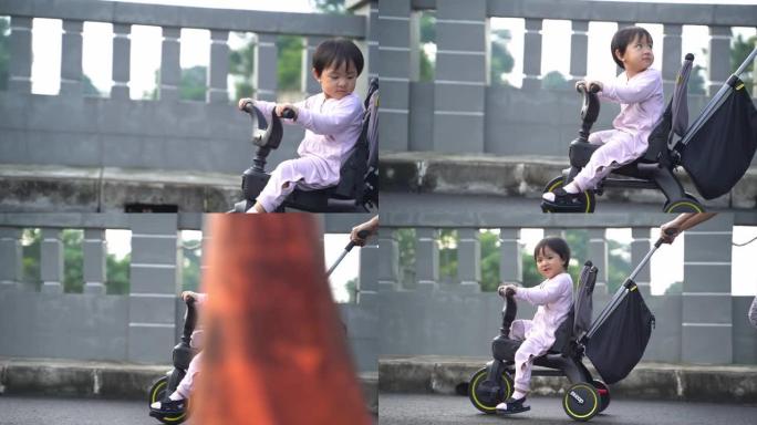 一个小女孩在户外骑第一辆自行车的特写镜头