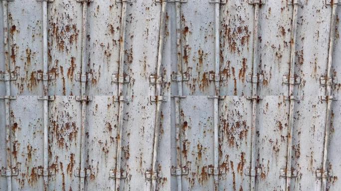 古董陈年生锈金属门背景。锈蚀表面