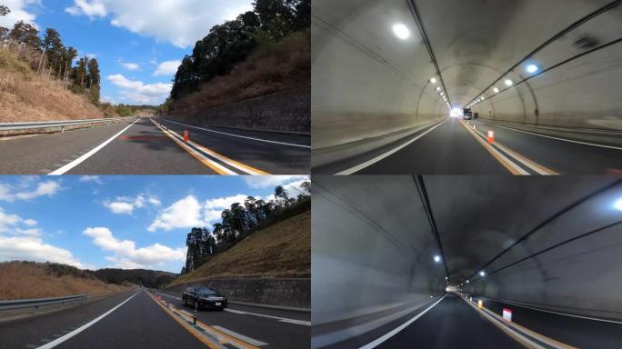 开车穿过高速公路。高速公路隧道入口。隧道尽头的光/高速