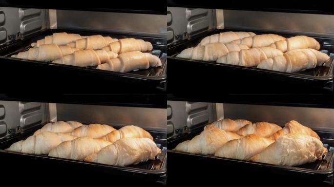 延时-六个自制羊角面包在家里的电烤箱中烘烤和上升