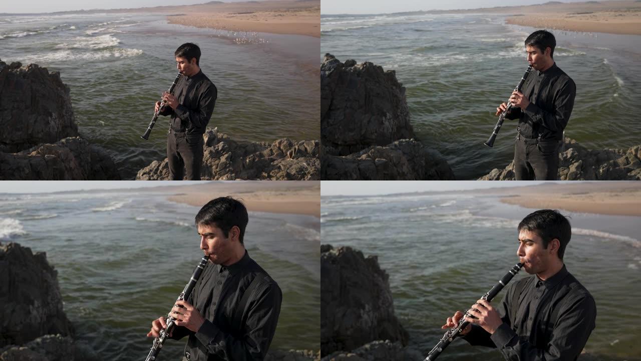 年轻的音乐家在海上的岩石上演奏单簧管，背景是海浪和海滩