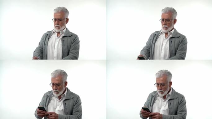 一位老人看着智能手机，对应用程序中的loary游戏产生了情绪反应。在白色背景上。