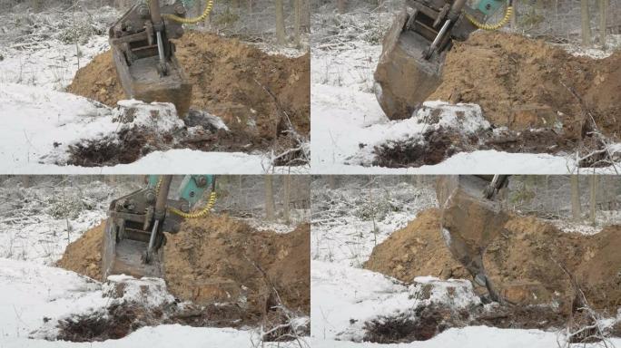 挖掘机的铲斗扎根在爱沙尼亚