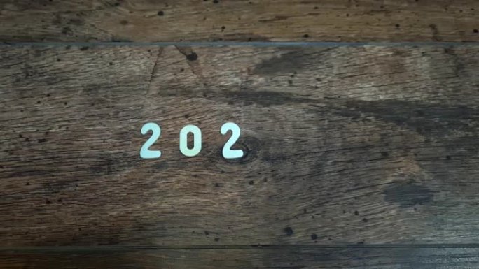 木制背景视频4k上手指数字变化的新2023年