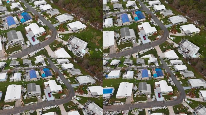 4k无人机视频显示佛罗里达州北港被飓风伊恩摧毁的房屋中的森林碎片-23