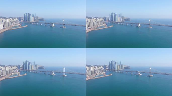 釜山: 韩国城市的鸟瞰图，海云台区的天际线与现代高层建筑 (摩天大楼)，晴天与蓝天-从上方看亚洲东部