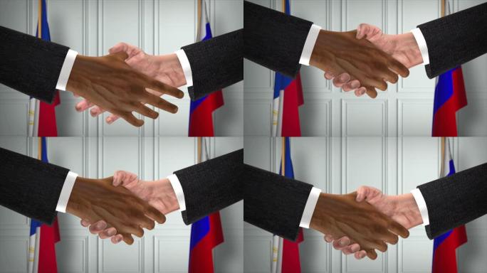 菲律宾和俄罗斯的协议握手，政治例证。正式会议或合作，商务见面。商人和政客握手