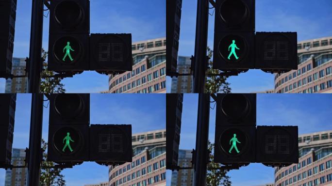 交叉灯。行人绿灯。人行道上点燃的交通信号灯。交通信号。人行横道。穿越车道的可能性。版本1