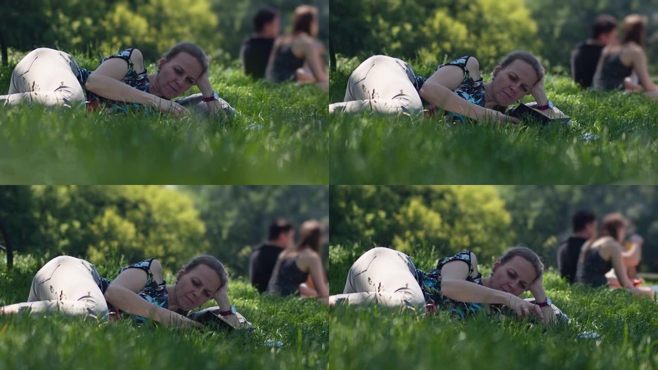 女人集体去公园看书或躺在草地上学习
