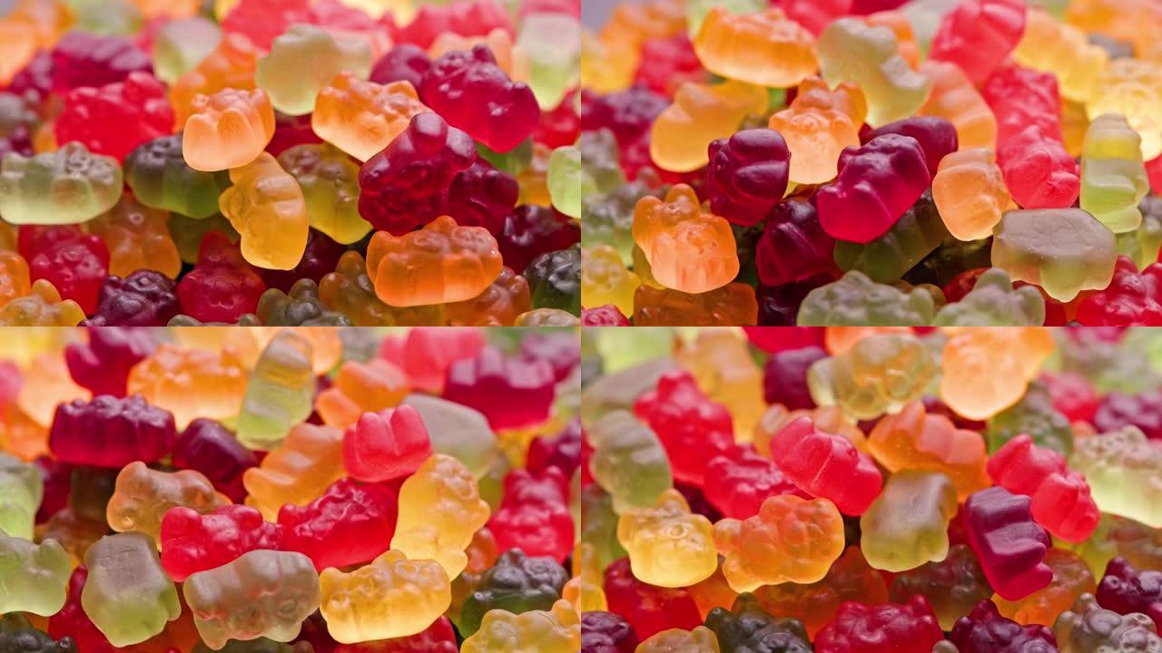 彩色果冻熊糖果的全框循环旋转背景