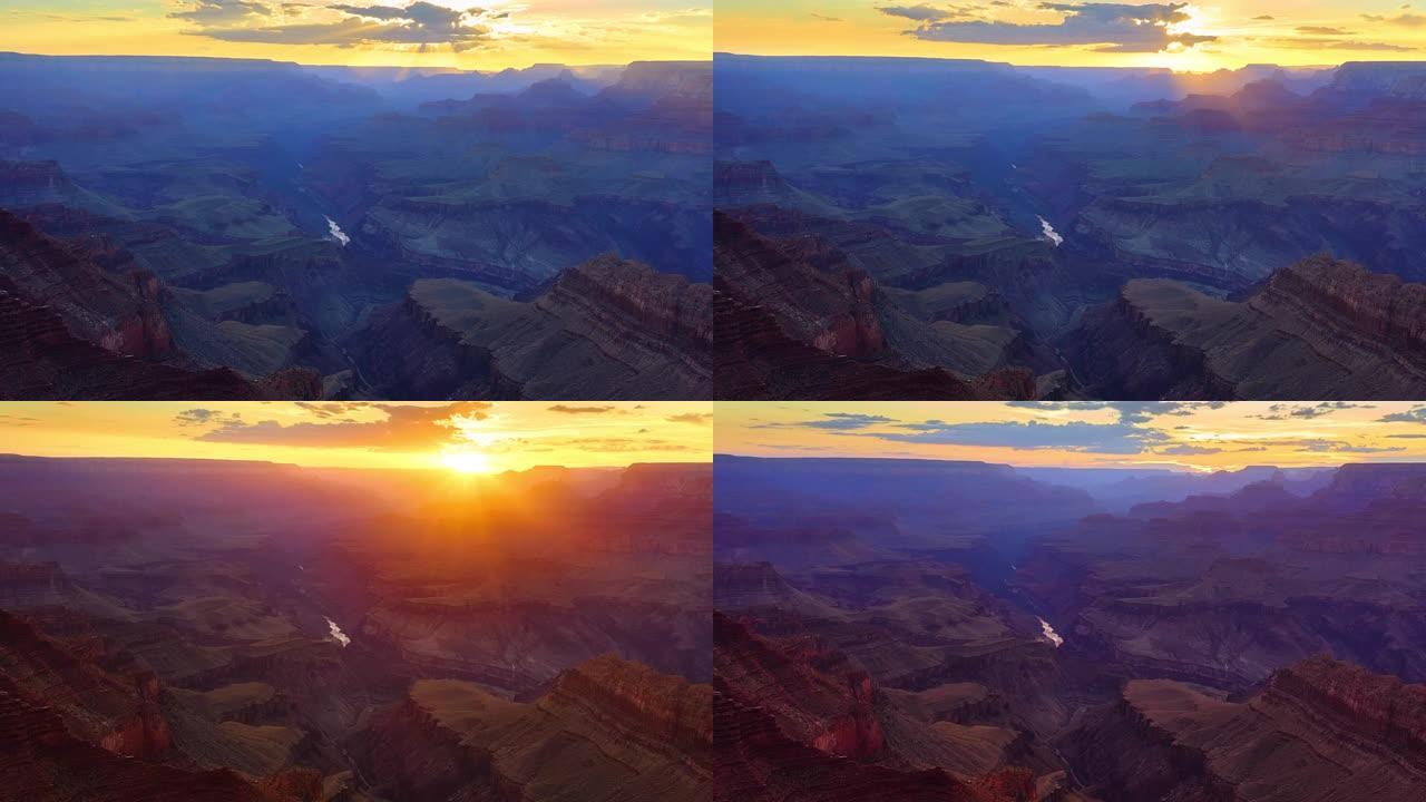 层层峡谷被夕阳的奇妙色彩所充满。亚利桑那州大峡谷。