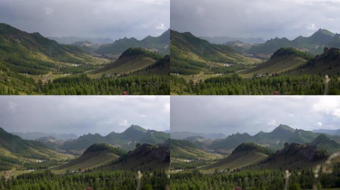 泰勒吉国家公园景观，蒙古山脊山脉。山谷概览，背景是引人注目的天空。