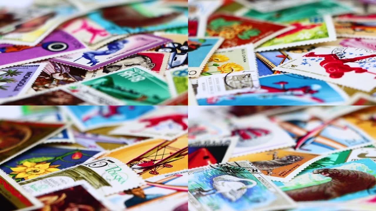 来自不同国家的邮票在旋转。