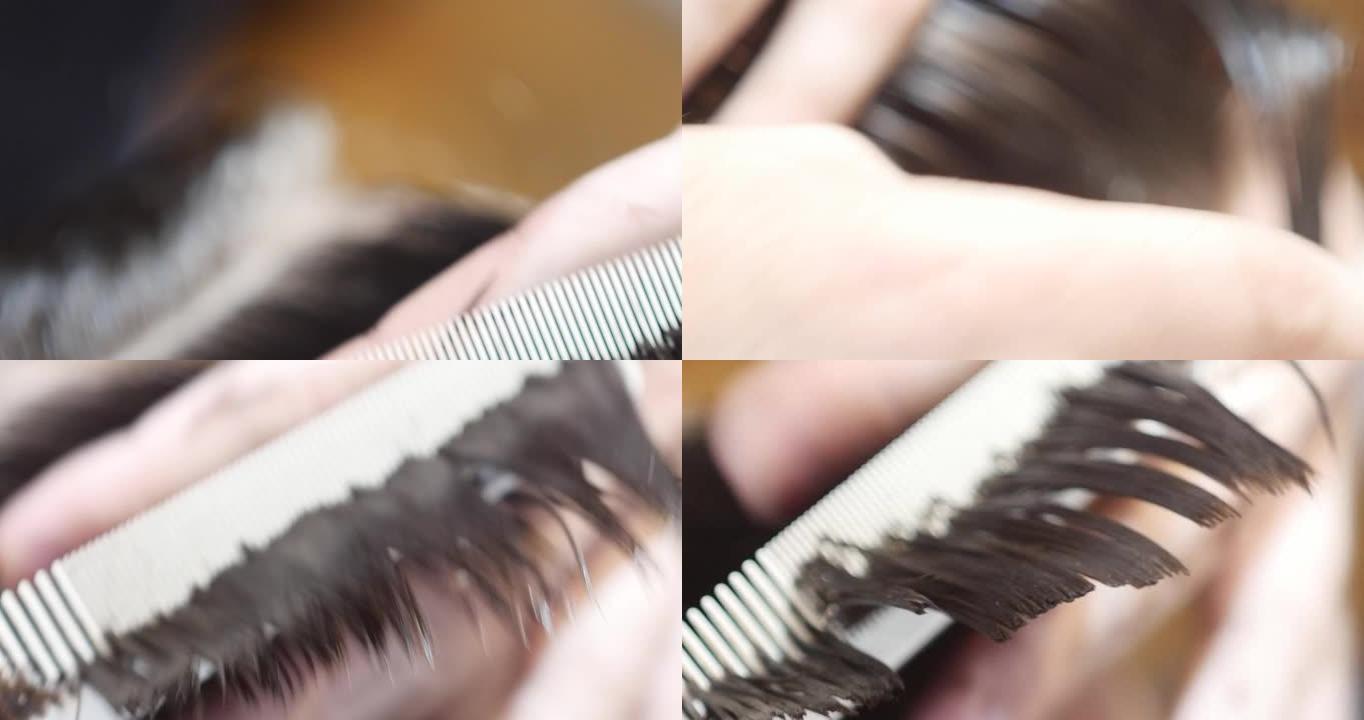 理发师用梳子制作造型特写慢动作35a