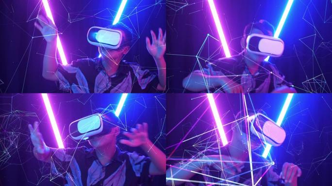 Vr，未来派，娱乐概念。兴奋的亚洲男孩使用虚拟现实耳机和背景霓虹灯有趣的舞蹈