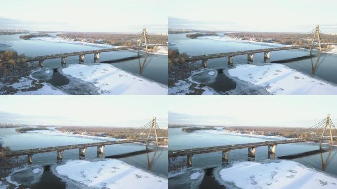 2月10日乌克兰基辅，南桥。从飞行的高度观看，在日落期间的冬季景观。