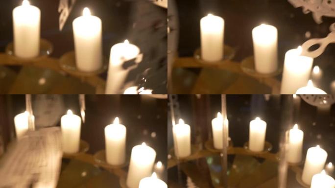 降临节白色蜡烛上的旋转装饰由胶合板制成，描绘天使或圣诞树14p2