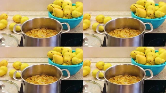 用糖浆煮水果。在家用黄色梨制作果酱