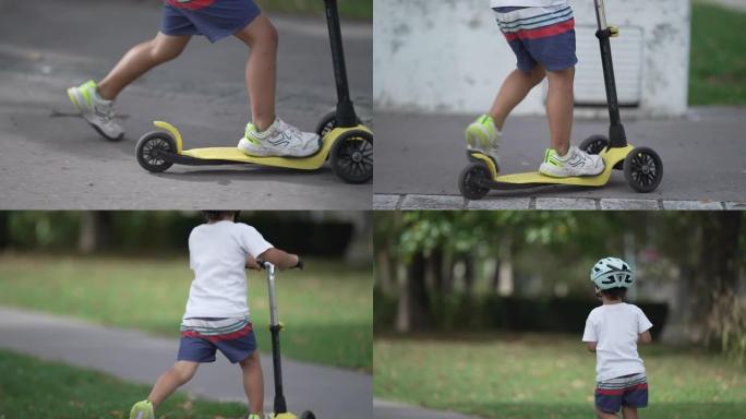 近距离儿童脚骑三轮踏板车在外面。活跃的运动小男孩在公园锻炼。戴头盔的孩子