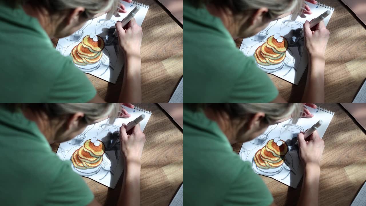 女人在家用铅笔在食物相册中画画