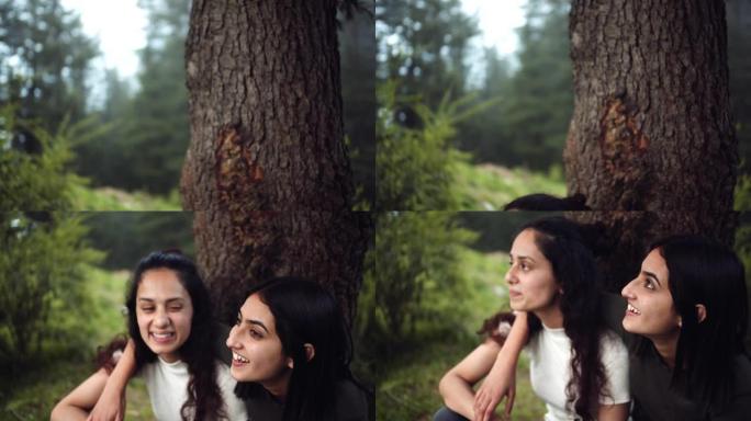 两个南亚密友在4k拍摄的森林中闲逛的焦点