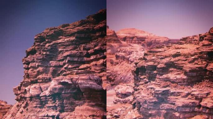 红色星球火星干旱峡谷的无人机飞行视图垂直视频