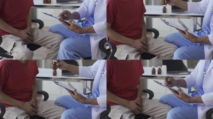 亚洲的医生和病人都接受前列腺检查。一名男子向医生咨询前列腺癌，早泄，勃起功能障碍膀胱标准