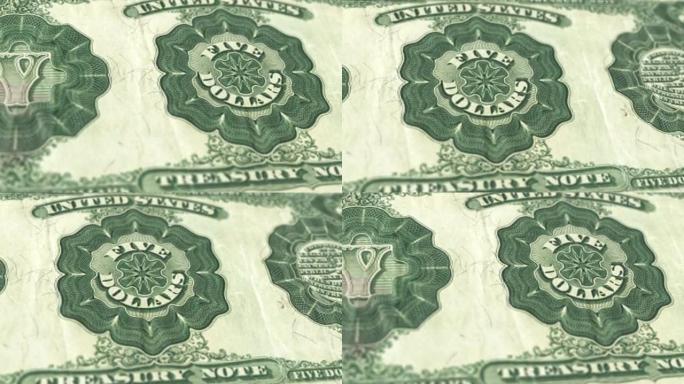 美国国库券5张钞票，五张美国国库券，美国国库券美元的特写和宏观视图，跟踪和多莉镜头5美国国库券钞票观