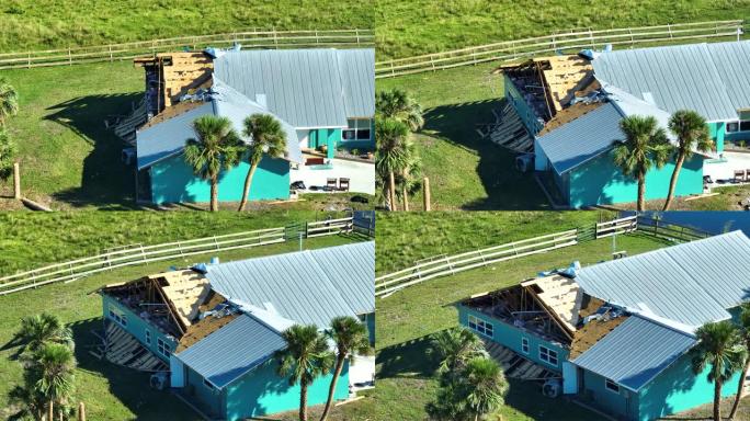 飓风伊恩摧毁了佛罗里达州居民区的房屋屋顶。自然灾害及其后果
