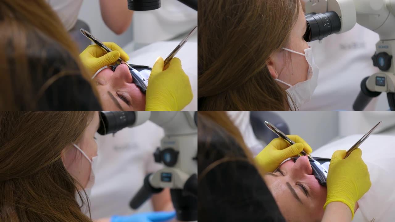 牙科预防龋齿的评论。牙科手术中牙医椅子上的一名妇女黄色清洗手套