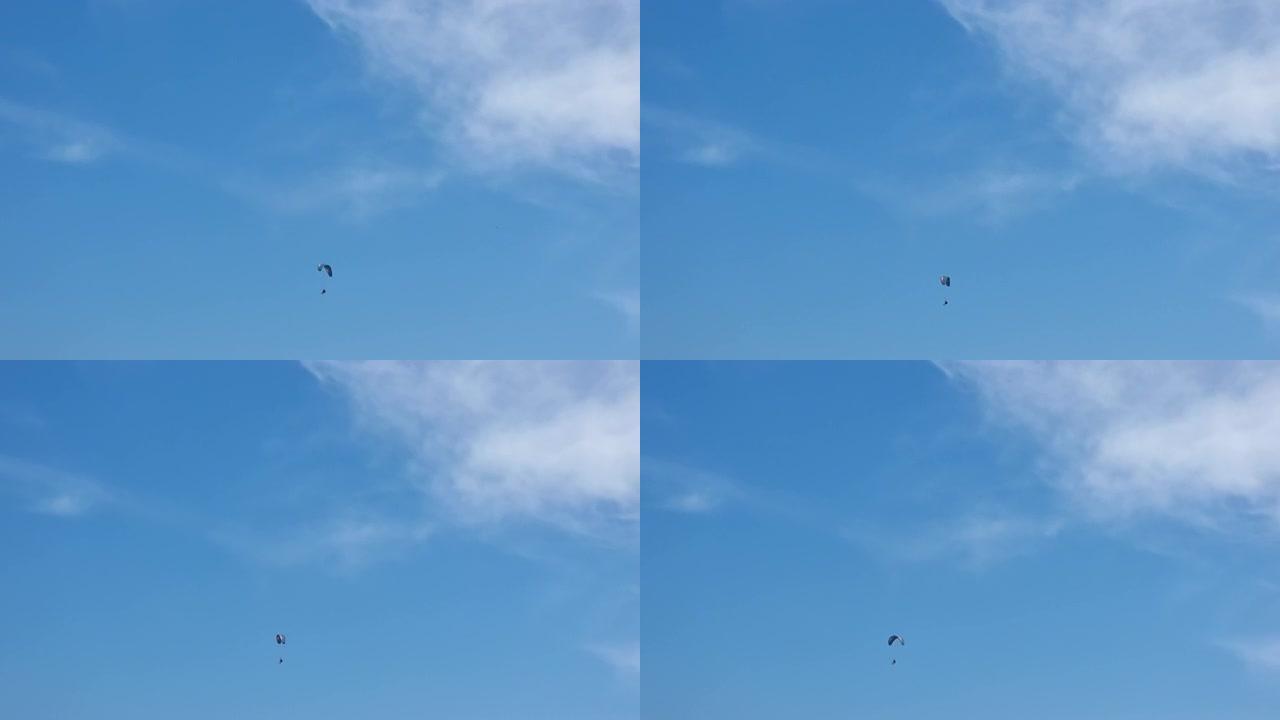 一个隐形的跳伞者用降落伞降落